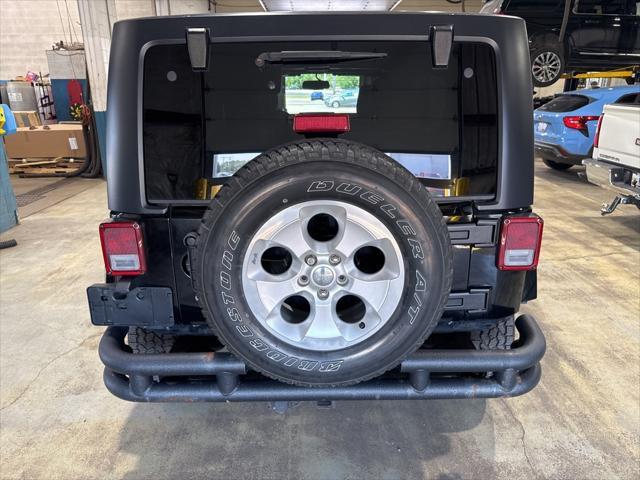 used 2013 Jeep Wrangler Unlimited car, priced at $15,987
