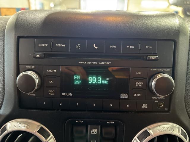 used 2013 Jeep Wrangler Unlimited car, priced at $15,987