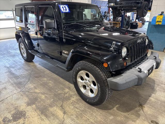 used 2013 Jeep Wrangler Unlimited car, priced at $15,987