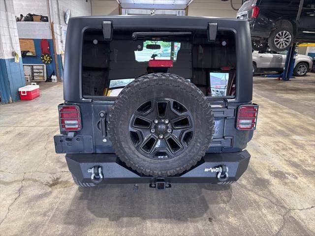 used 2016 Jeep Wrangler car, priced at $14,326