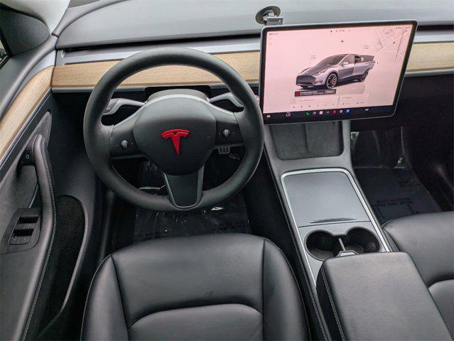 used 2023 Tesla Model Y car, priced at $33,900