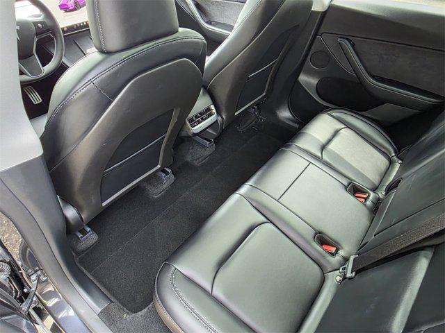 used 2024 Tesla Model Y car, priced at $38,417