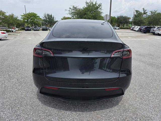 used 2024 Tesla Model Y car, priced at $38,417