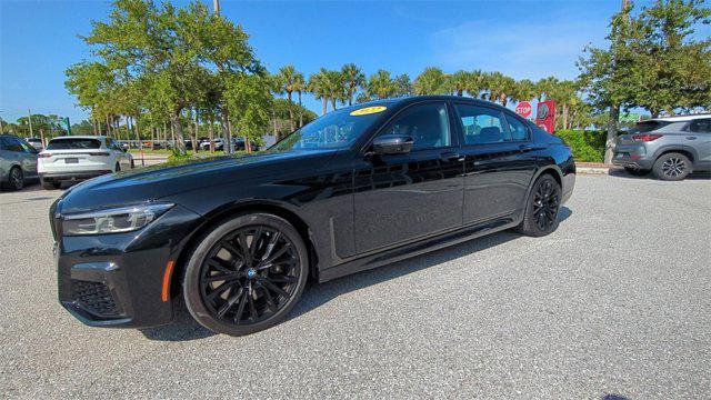 used 2022 BMW 740 car, priced at $50,740