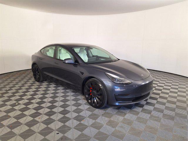 used 2023 Tesla Model 3 car, priced at $32,106