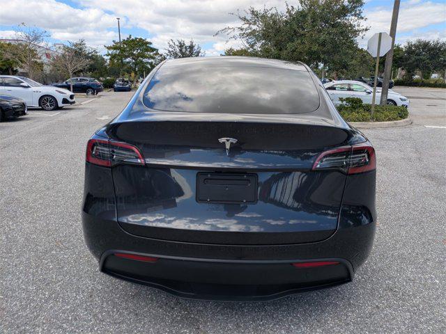 used 2024 Tesla Model Y car, priced at $32,550