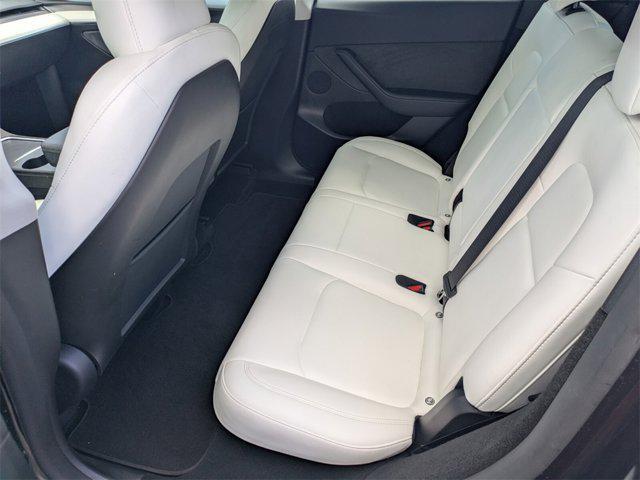 used 2024 Tesla Model Y car, priced at $32,550