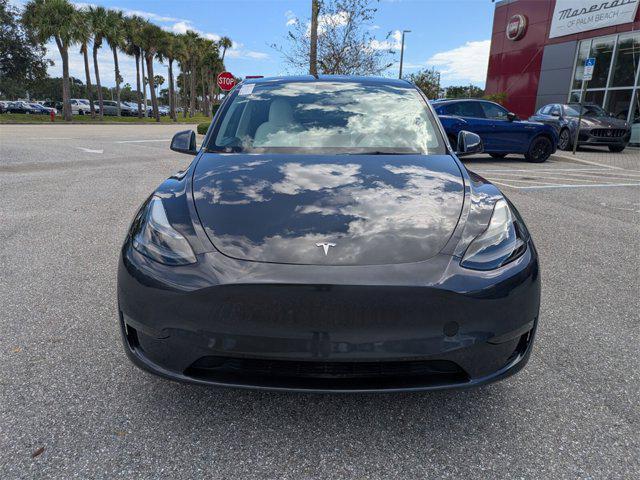 used 2024 Tesla Model Y car, priced at $32,550
