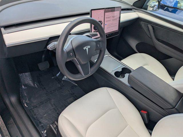 used 2024 Tesla Model Y car, priced at $32,550
