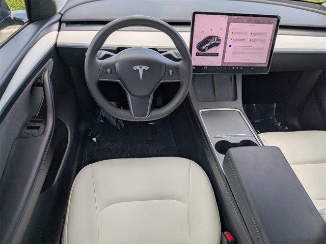 used 2024 Tesla Model Y car, priced at $32,550