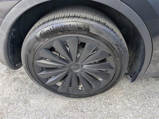 used 2024 Tesla Model Y car, priced at $32,550