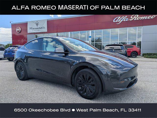 used 2024 Tesla Model Y car, priced at $32,550