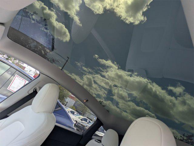 used 2024 Tesla Model Y car, priced at $32,550