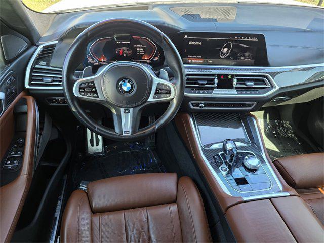 used 2022 BMW X6 car, priced at $57,605