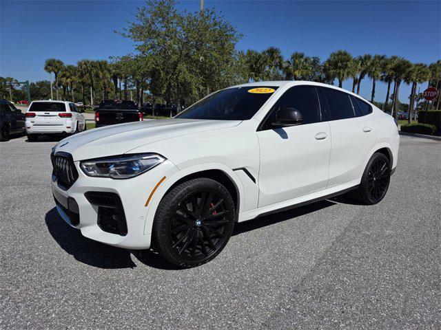 used 2022 BMW X6 car, priced at $57,605