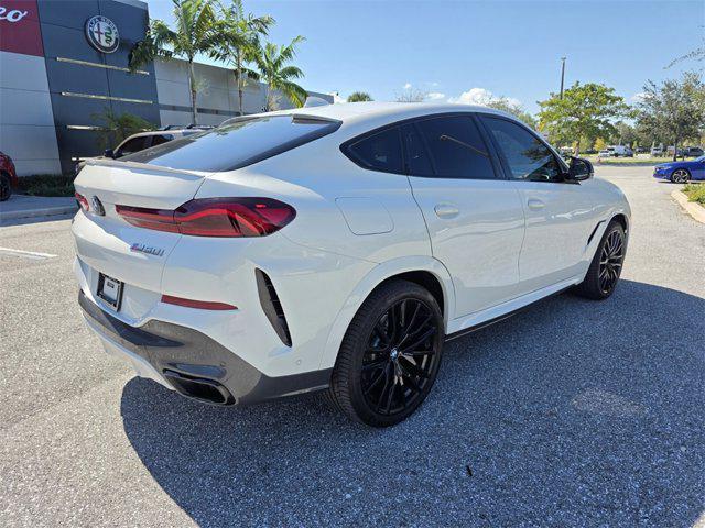 used 2022 BMW X6 car, priced at $57,605