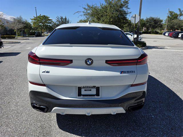 used 2022 BMW X6 car, priced at $57,605