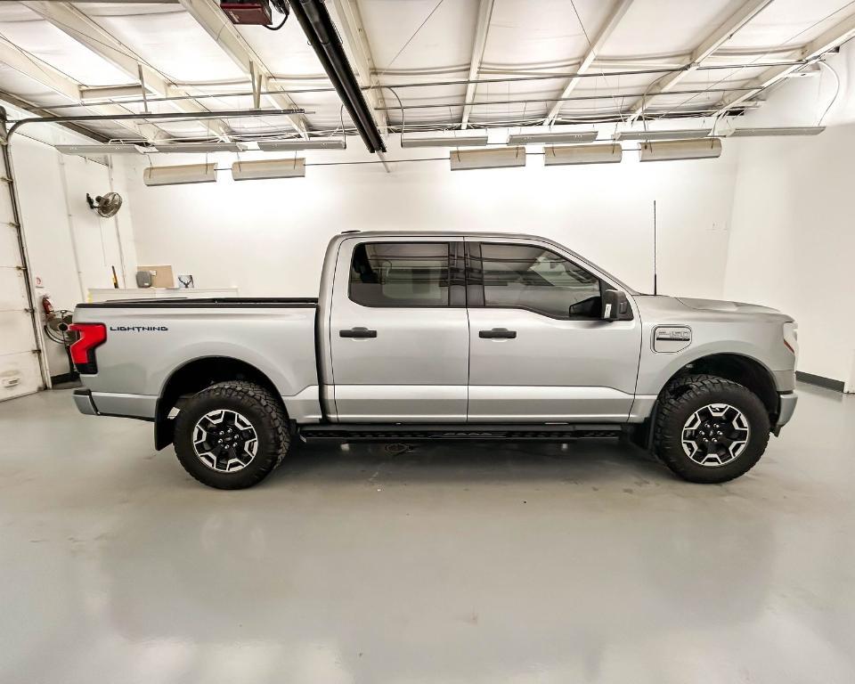 used 2023 Ford F-150 Lightning car, priced at $36,673