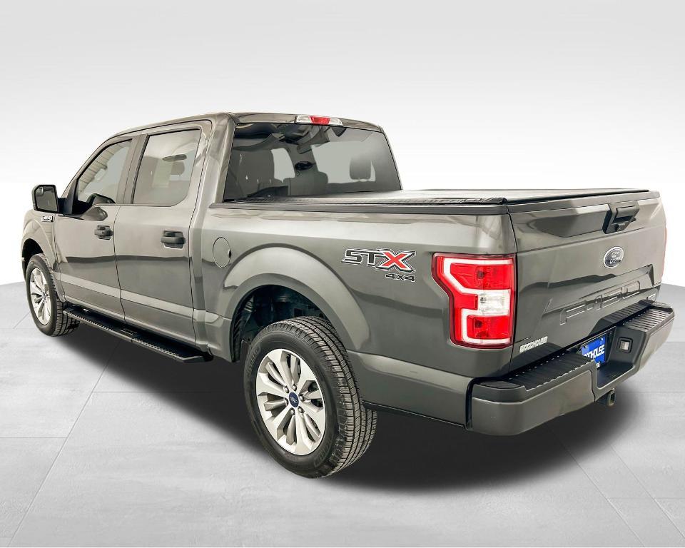 used 2018 Ford F-150 car, priced at $26,563