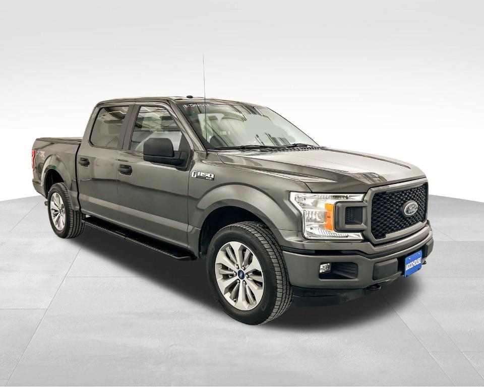 used 2018 Ford F-150 car, priced at $26,563