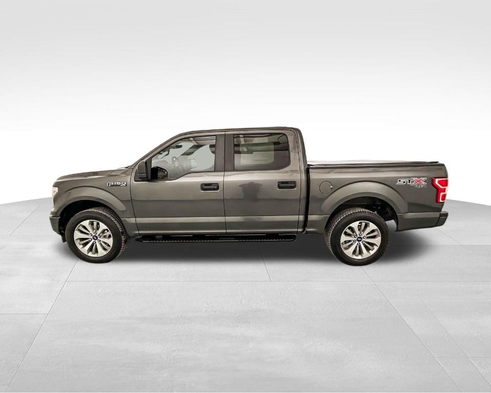 used 2018 Ford F-150 car, priced at $26,563