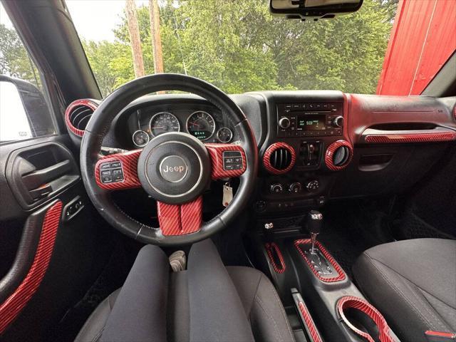 used 2015 Jeep Wrangler Unlimited car, priced at $16,999