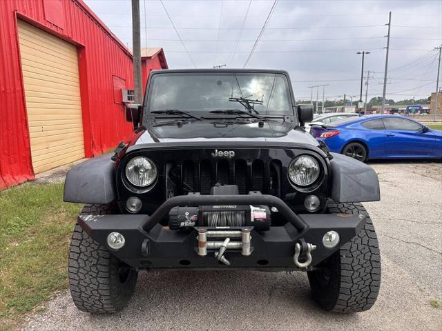 used 2015 Jeep Wrangler Unlimited car, priced at $16,999