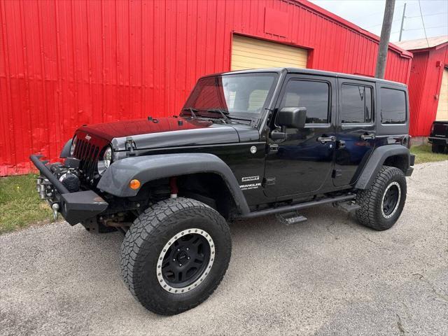 used 2015 Jeep Wrangler Unlimited car, priced at $16,999