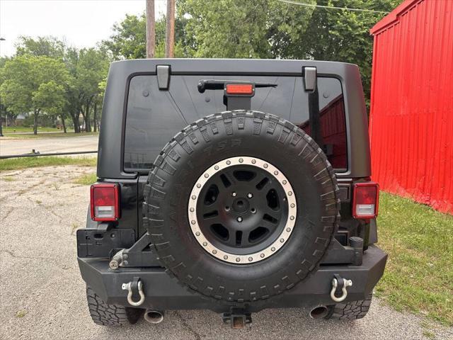 used 2015 Jeep Wrangler Unlimited car, priced at $16,999