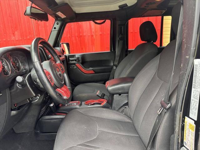 used 2015 Jeep Wrangler Unlimited car, priced at $16,999