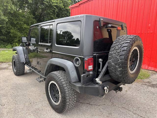 used 2015 Jeep Wrangler Unlimited car, priced at $16,999