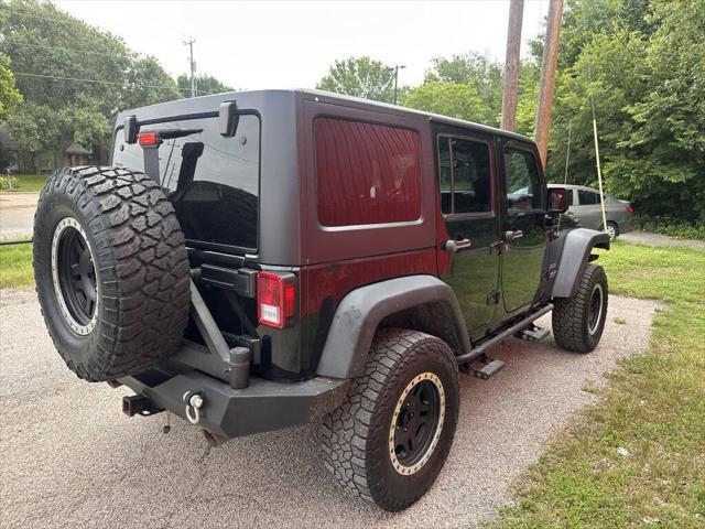 used 2015 Jeep Wrangler Unlimited car, priced at $16,999