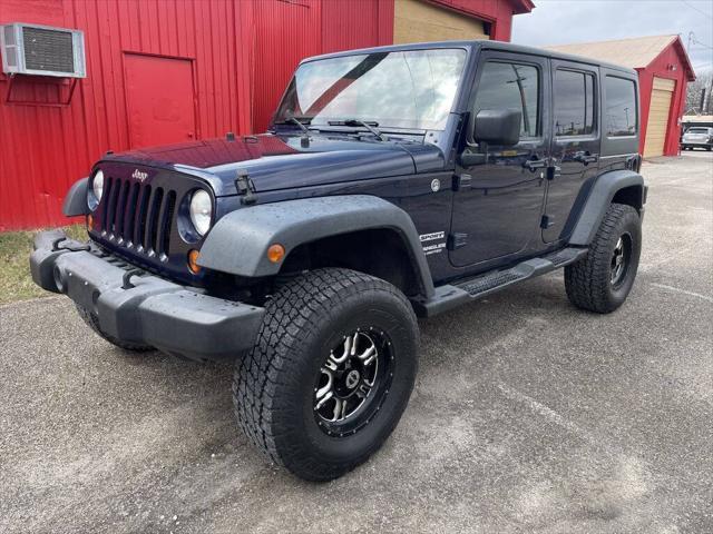 used 2013 Jeep Wrangler Unlimited car, priced at $15,499