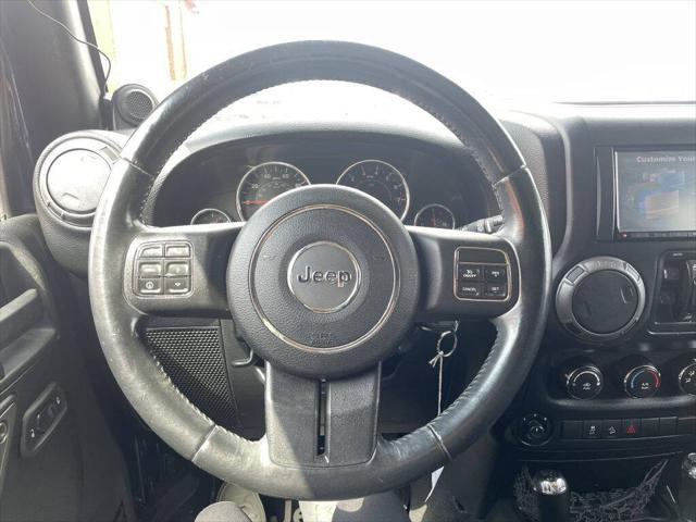 used 2013 Jeep Wrangler Unlimited car, priced at $15,499