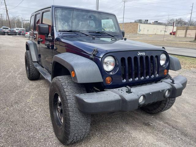 used 2013 Jeep Wrangler Unlimited car, priced at $15,499