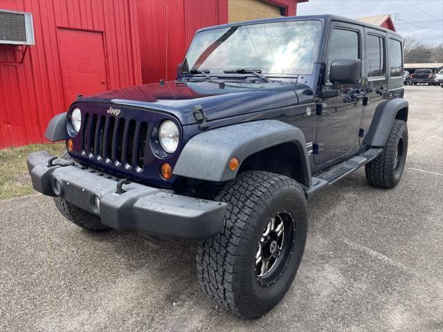 used 2013 Jeep Wrangler Unlimited car, priced at $15,499