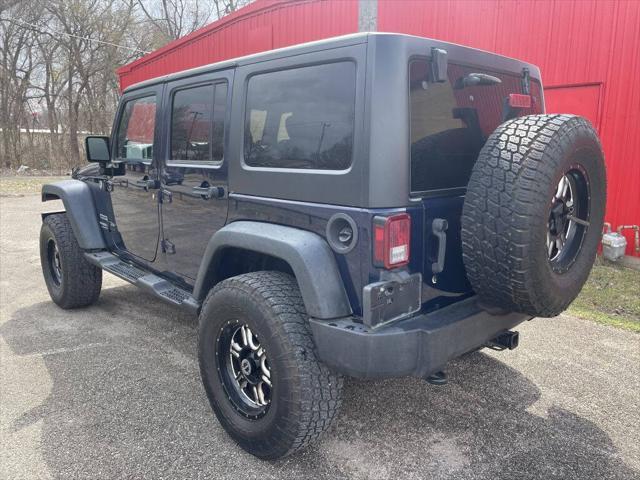 used 2013 Jeep Wrangler Unlimited car, priced at $15,499