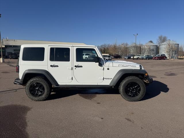 used 2013 Jeep Wrangler Unlimited car, priced at $20,404