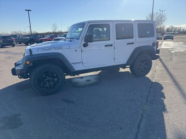 used 2013 Jeep Wrangler Unlimited car, priced at $20,404