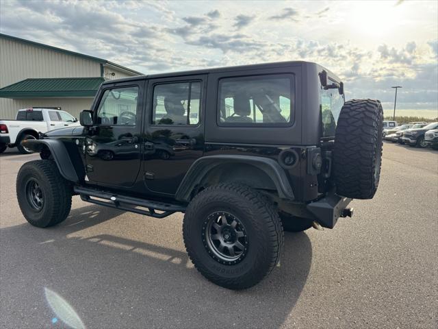 used 2016 Jeep Wrangler Unlimited car, priced at $23,716