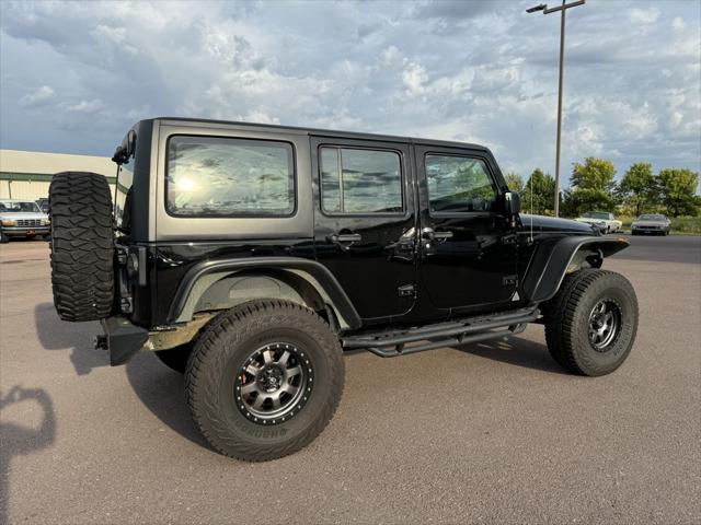 used 2016 Jeep Wrangler Unlimited car, priced at $23,716