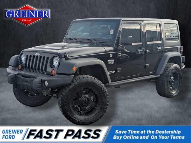 used 2012 Jeep Wrangler Unlimited car, priced at $24,250