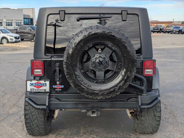 used 2012 Jeep Wrangler Unlimited car, priced at $24,250