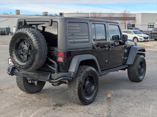 used 2012 Jeep Wrangler Unlimited car, priced at $24,250