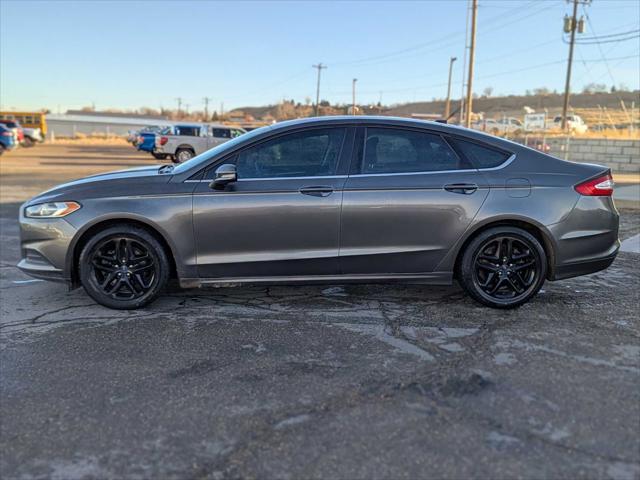 used 2016 Ford Fusion car, priced at $12,750