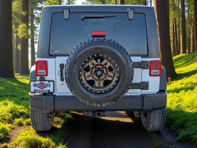 used 2011 Jeep Wrangler Unlimited car, priced at $17,795