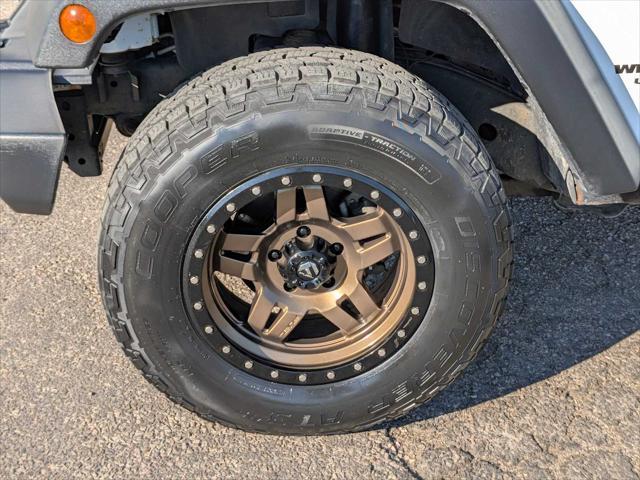 used 2011 Jeep Wrangler Unlimited car, priced at $17,795