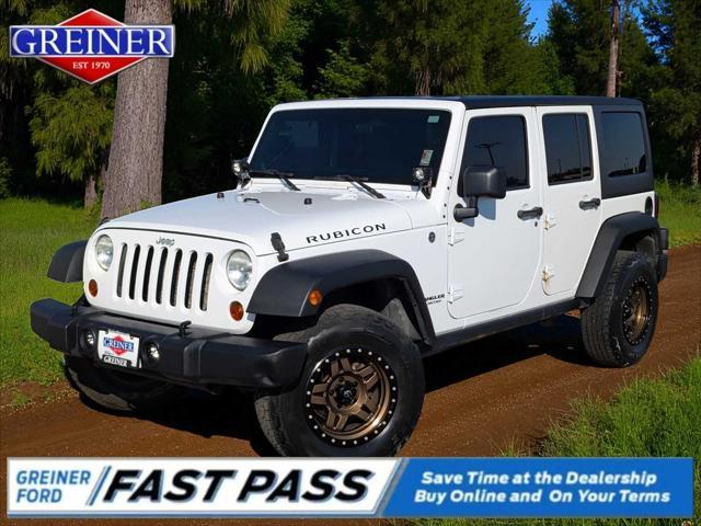 used 2011 Jeep Wrangler Unlimited car, priced at $17,795