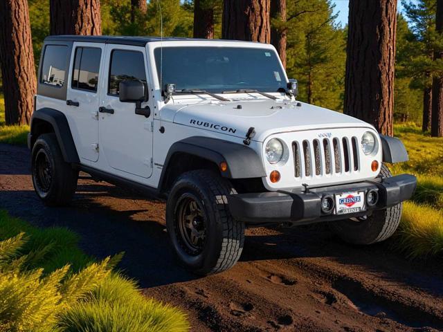 used 2011 Jeep Wrangler Unlimited car, priced at $17,795