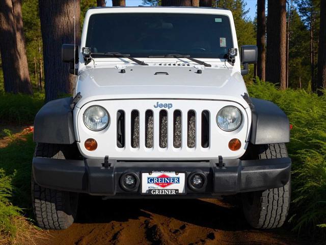 used 2011 Jeep Wrangler Unlimited car, priced at $17,795